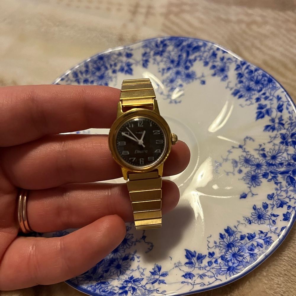 Timex gold stretchable wrist watch